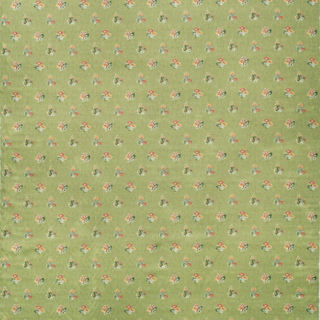 Leaf-green ground with tiny scattered coral, cream and blue floral sprigs