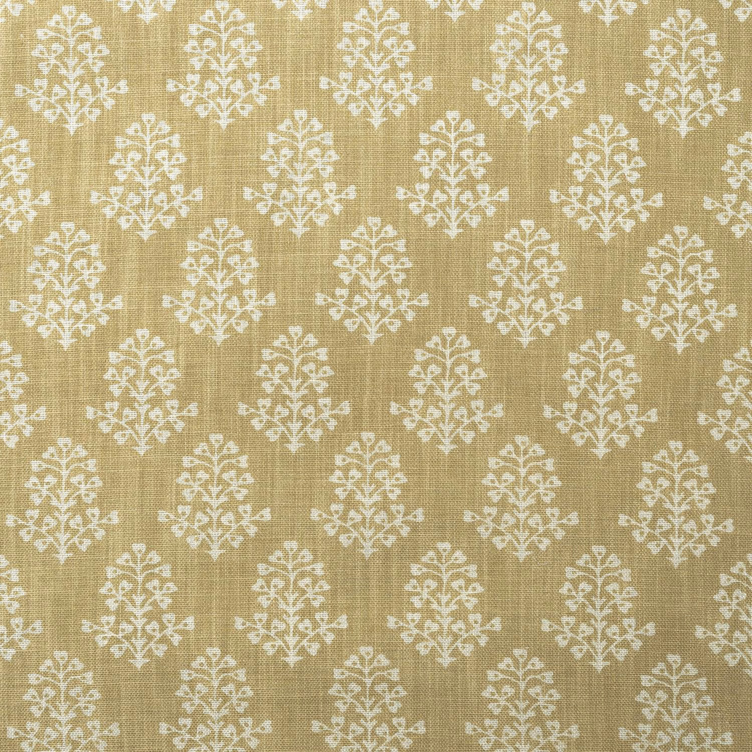 Honey-gold woven fabric with repeated ivory damask sprigs and fine crosshatched texture