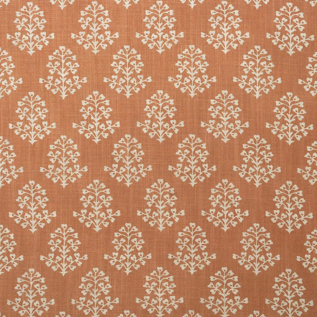 Terracotta textile with repeating cream botanical sprigs and a fine woven texture