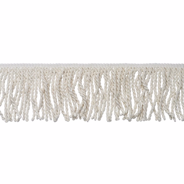 Pale ivory twisted cord fringe trim with an irregular textured edge