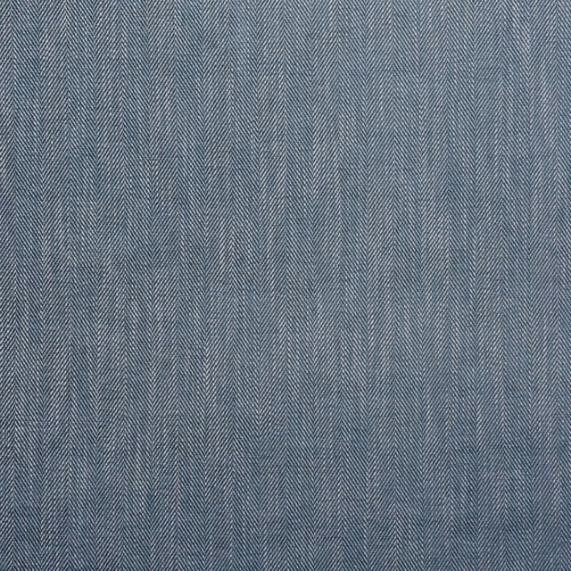 Muted denim-blue fabric with fine vertical herringbone weave and subtle slate-grey tonal variation