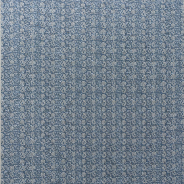 Muted denim-blue cotton print with tiny cream paisleys and sunflower-yellow flecks