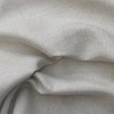 Pale natural beige cloth with fine herringbone weave gathered into soft fluid folds