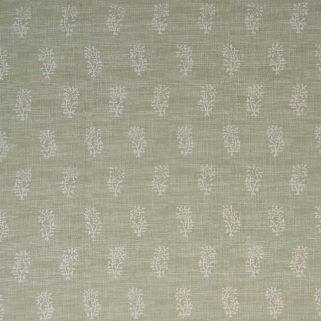 Muted sage-green woven ground with repeating ivory botanical sprigs and fine slub texture