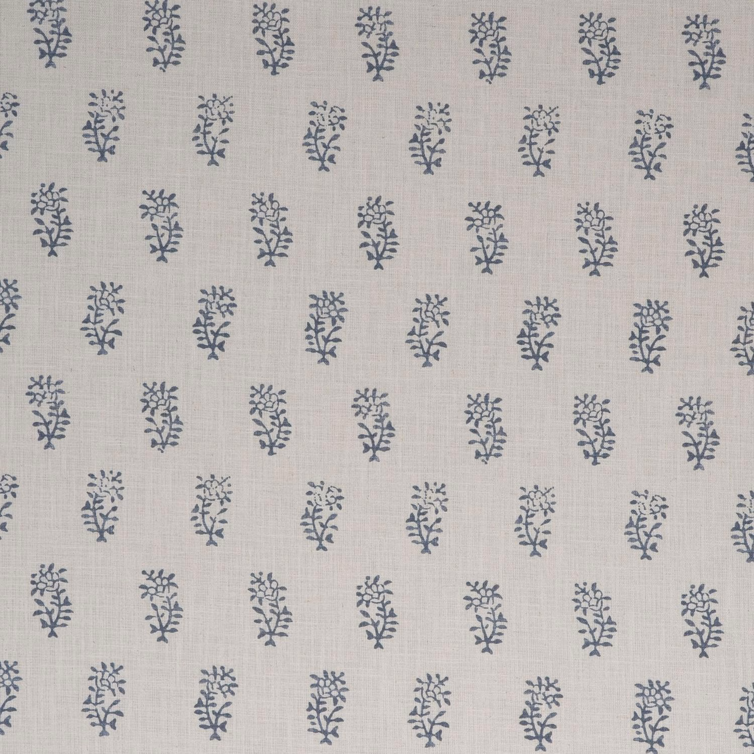 Pale linen-grey fabric with repeated blue-grey botanical sprigs and fine woven texture