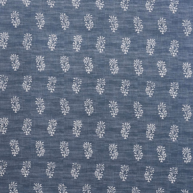 Blue-grey linen-look fabric with evenly spaced ivory botanical sprigs