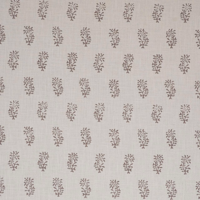 Pale beige woven fabric with evenly spaced taupe twig sprigs