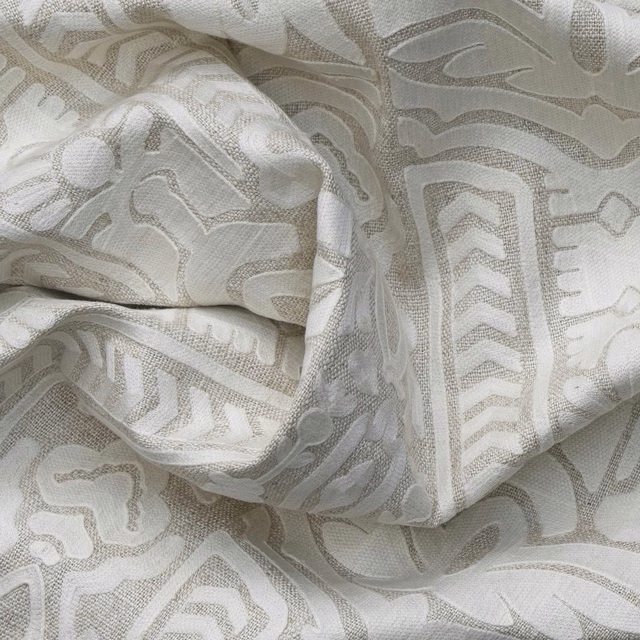 Ivory woven fabric with taupe-grey geometric arches, zigzags and organic linework