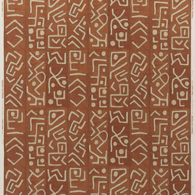 Brick terracotta outdoor fabric with chalk maze-like geometric motifs and subtle texture