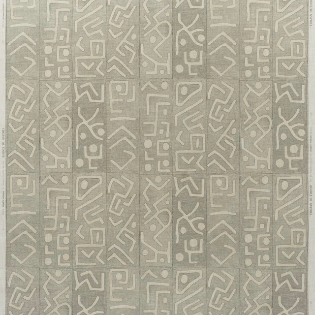 Muted sage-grey outdoor fabric with pale maze-like geometric lines and a softly textured ground