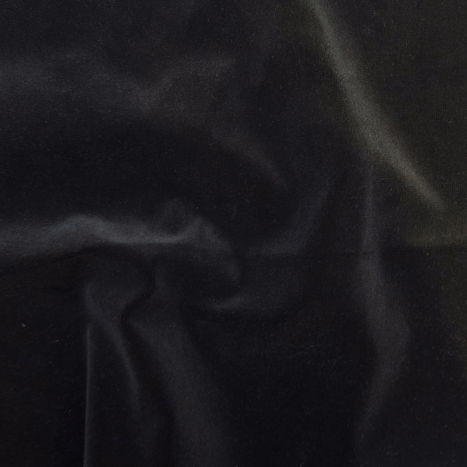 Near-black liquorice fabric with soft velvet-like sheen across folded surface