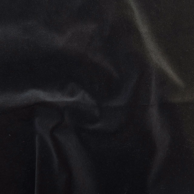 Near-black liquorice fabric with soft velvet-like sheen across folded surface