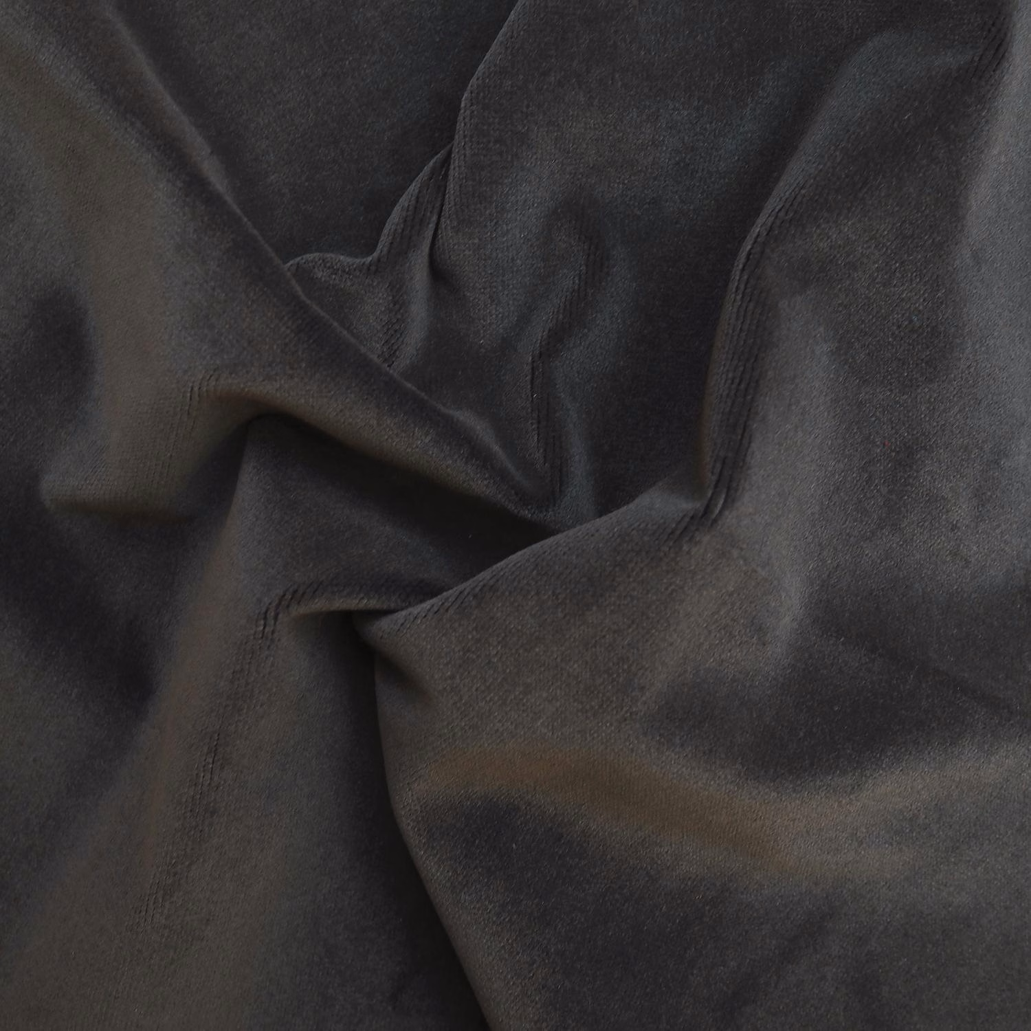 Deep slate-charcoal plush fabric folded to reveal soft graphite sheen
