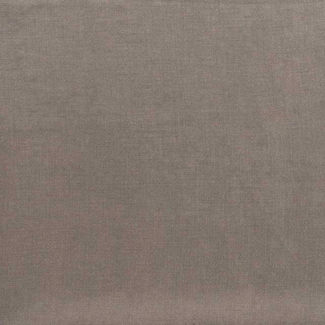 Close view of weathered warm-grey plain weave with subtle tonal texture