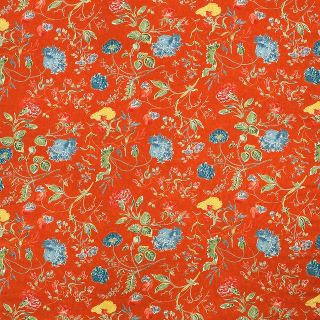 Pumpkin-red botanical print with blue flowers, green leaves and curling cream stems