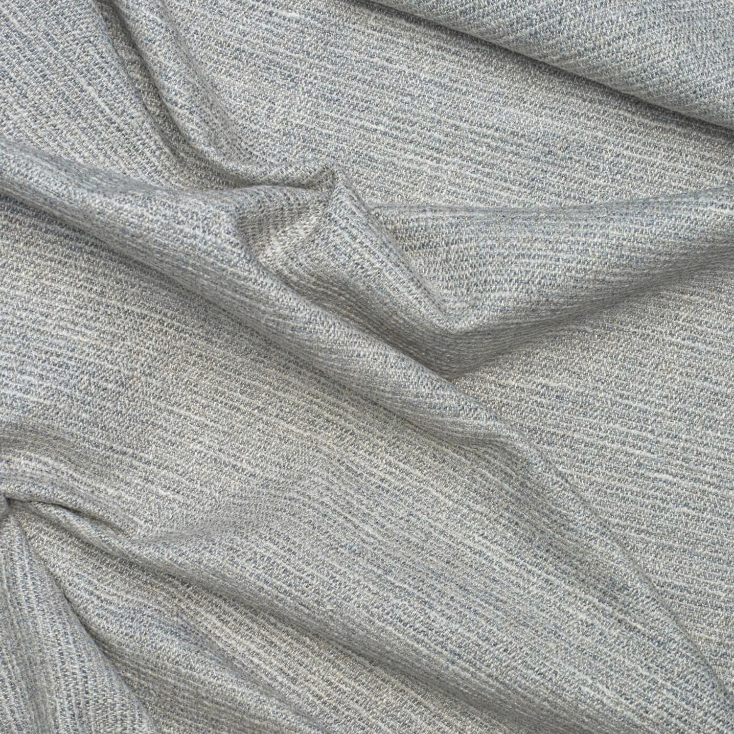 Cool grey woven fabric with fine heathered texture and softly folded surface