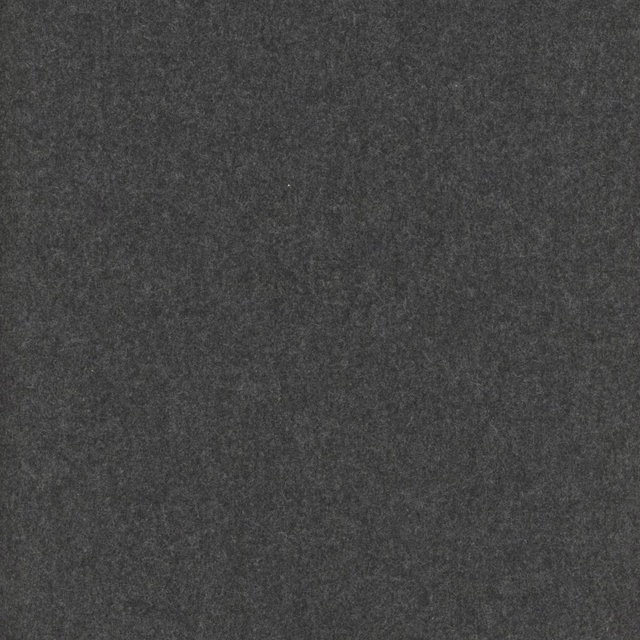 Close-up of deep charcoal grey fabric with a fine softly mottled texture