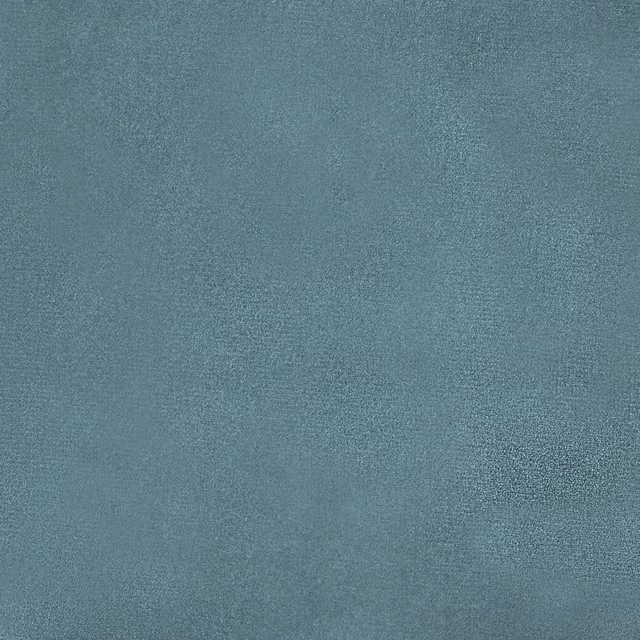 Soft aqua teal plain fabric with a fine matte woven texture