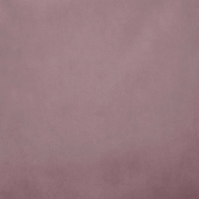Soft dusty mauve plain fabric with a smooth matte finish