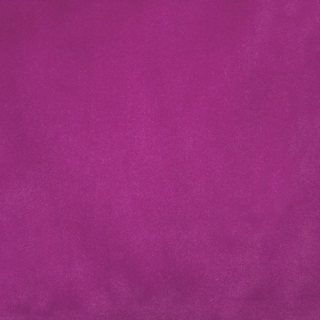 Vivid plum-pink plain fabric swatch with a soft matte, velvety finish