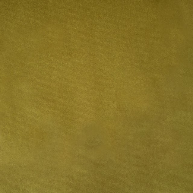 Muted lime green plain woven fabric with a smooth matte texture