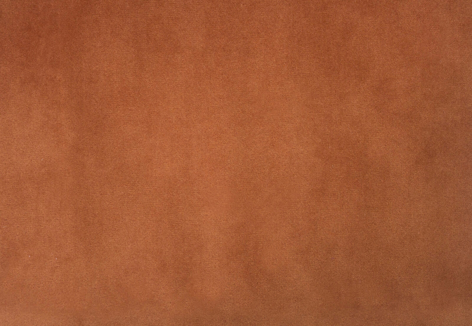 Rust orange plain fabric swatch with a soft matte, velvety surface