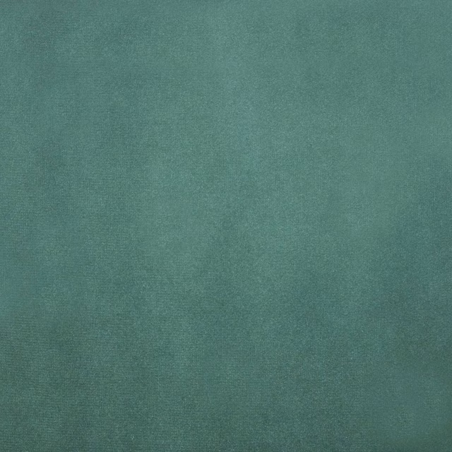 Soft seafoam teal plain woven fabric with a smooth matte texture