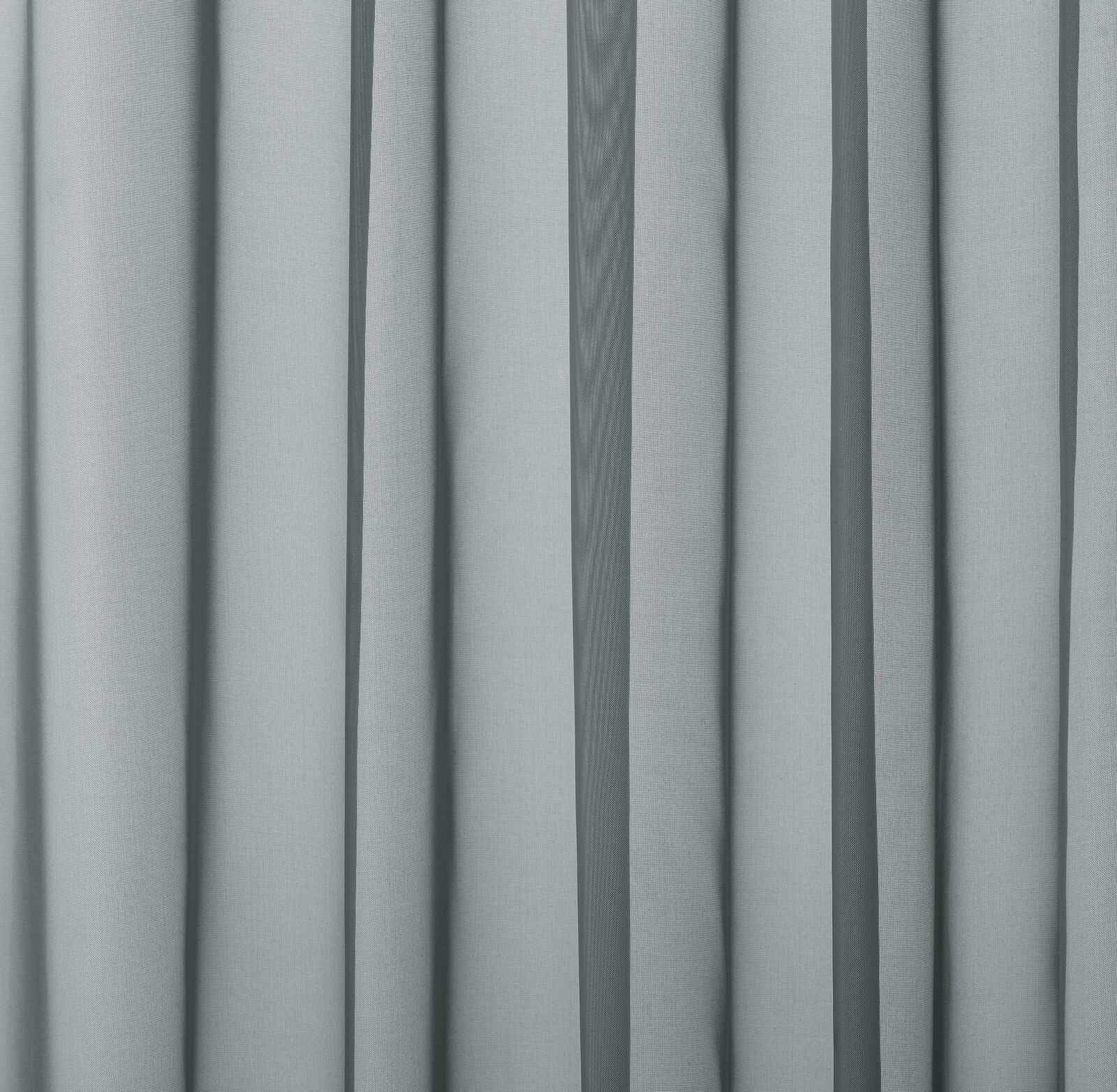 Soft aqua plain curtain fabric with a smooth fine weave and gentle folded drape