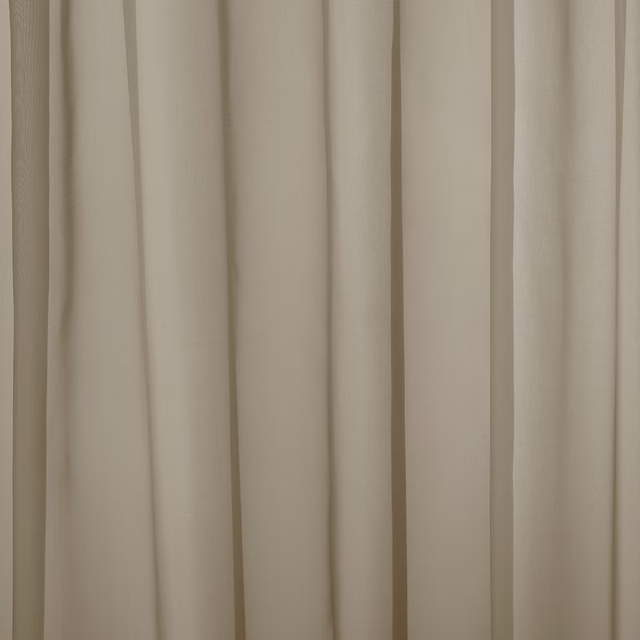 Soft fawn beige plain curtain fabric with a smooth matte finish