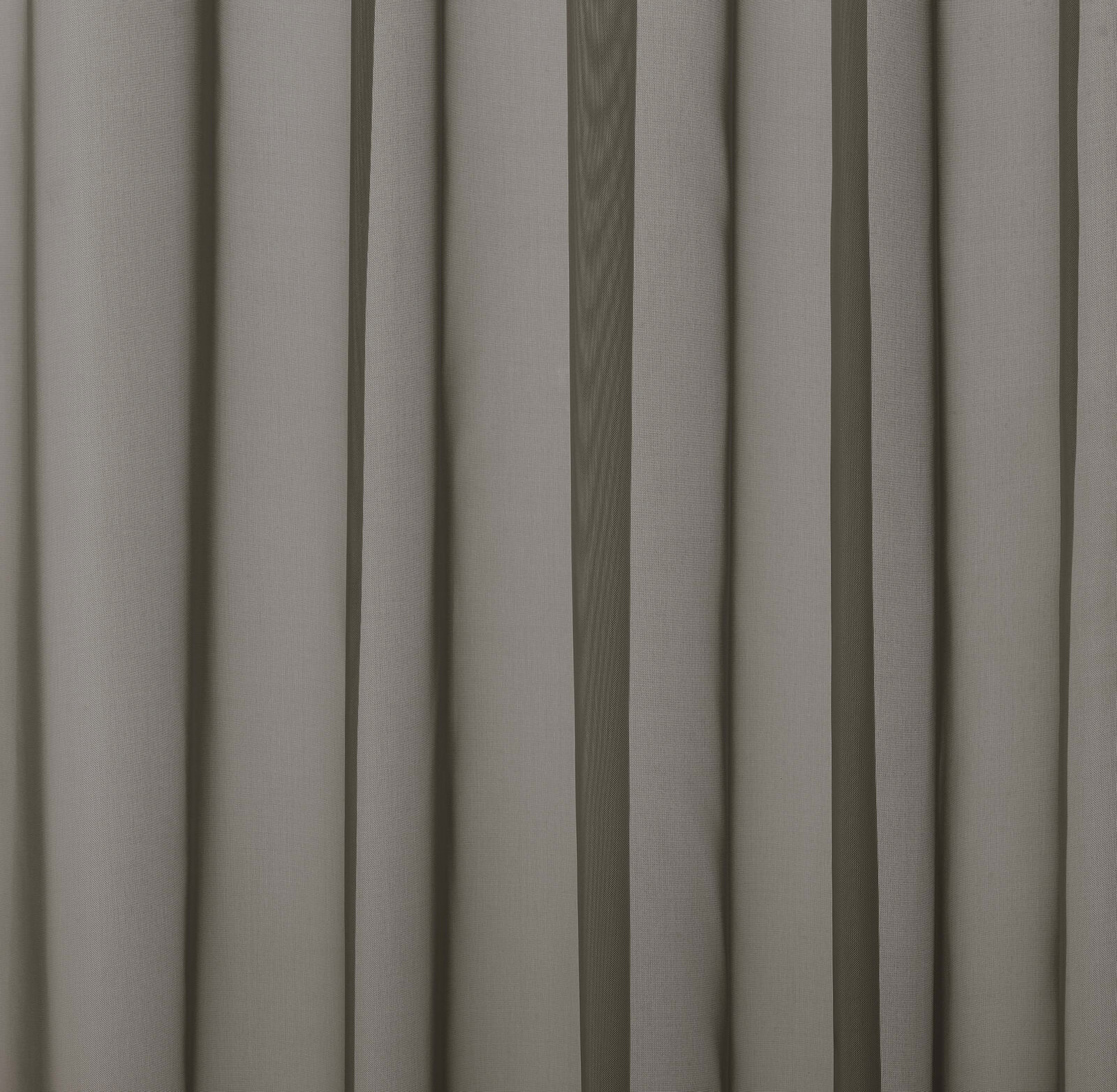 Soft taupe-grey plain curtain fabric shown in vertical folds