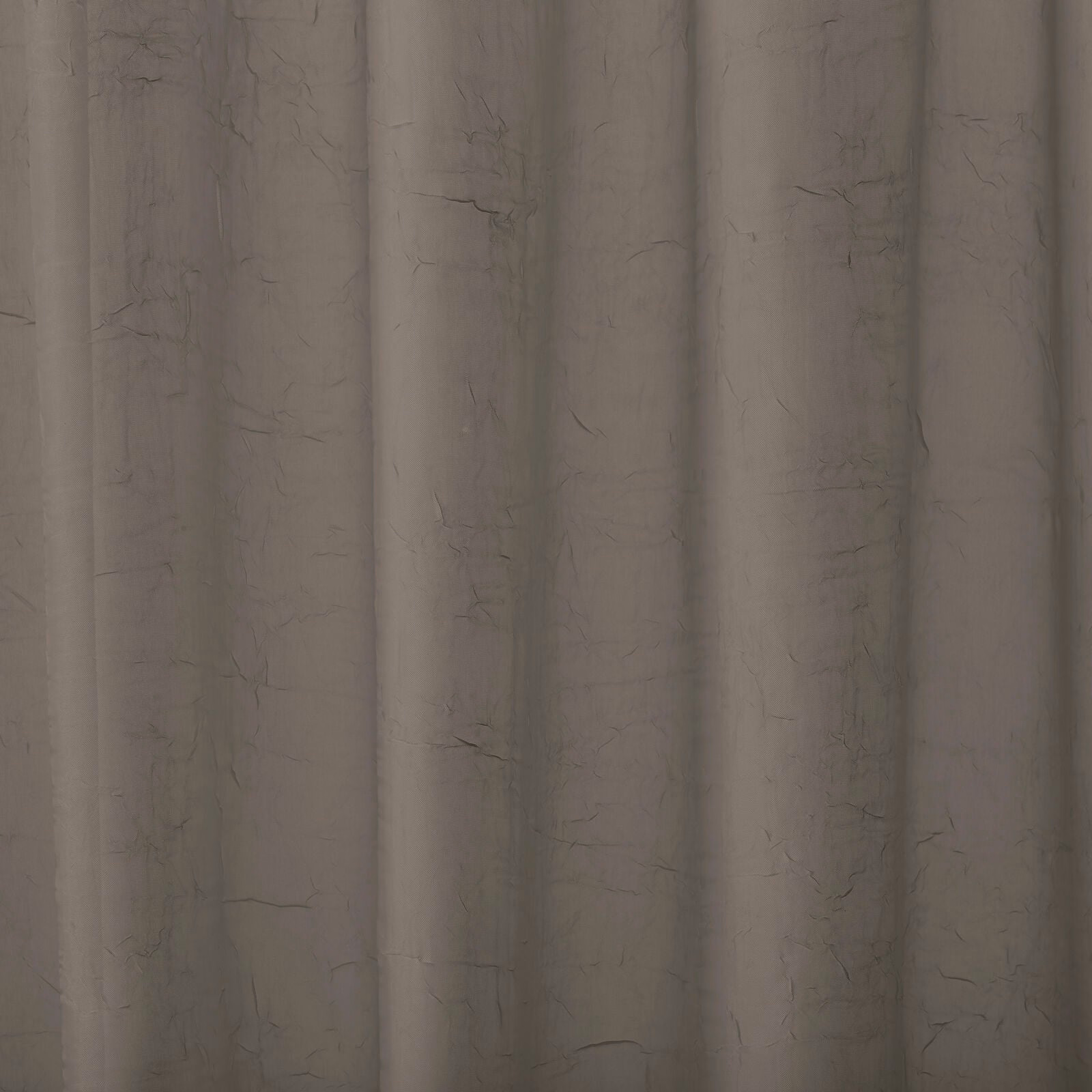 Soft grey taupe plain curtain fabric with a lightly crumpled textured surface