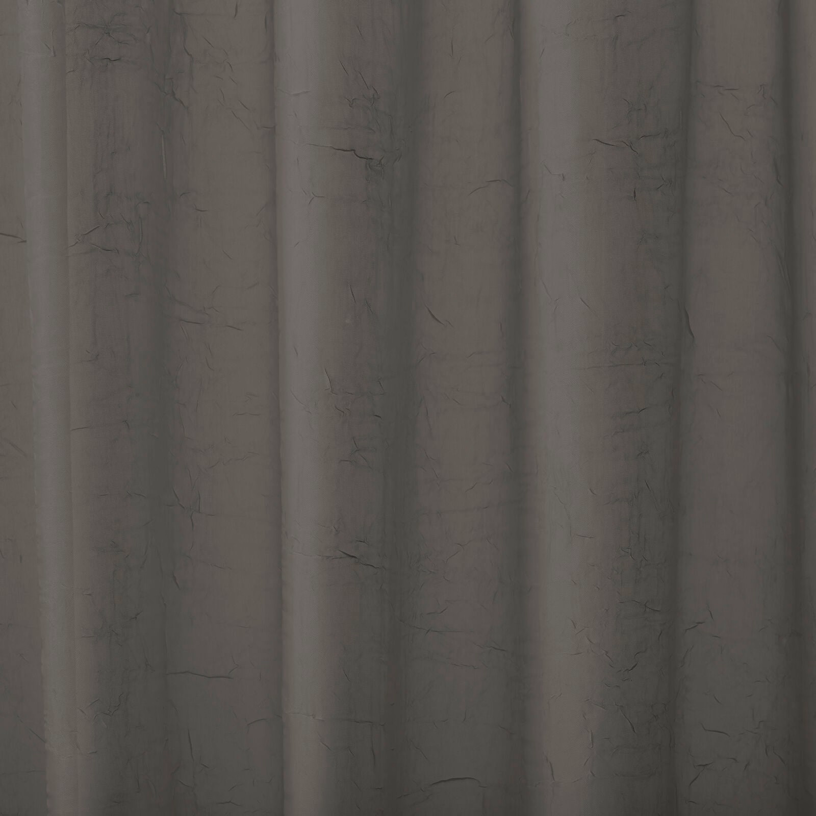 Smoky grey plain curtain fabric with soft crinkled texture and vertical folds