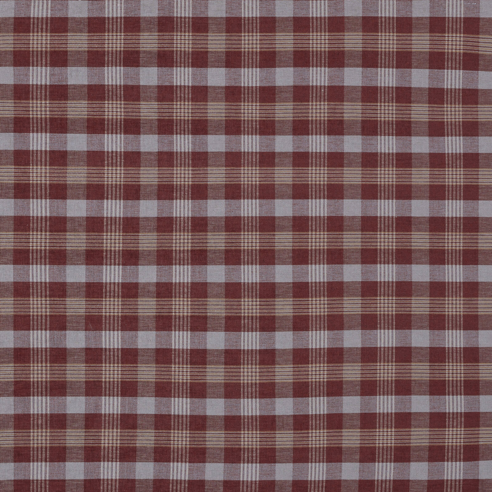 Muted red and cream checked woven fabric with fine plaid lines