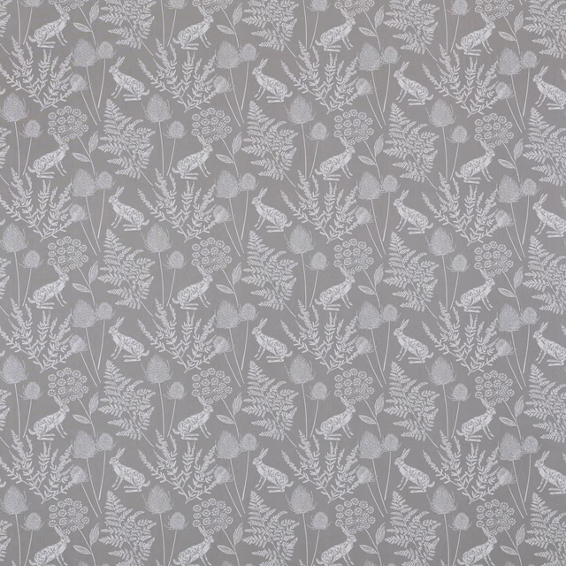 Grey cotton fabric with pale bird and botanical repeat on a dove-grey ground