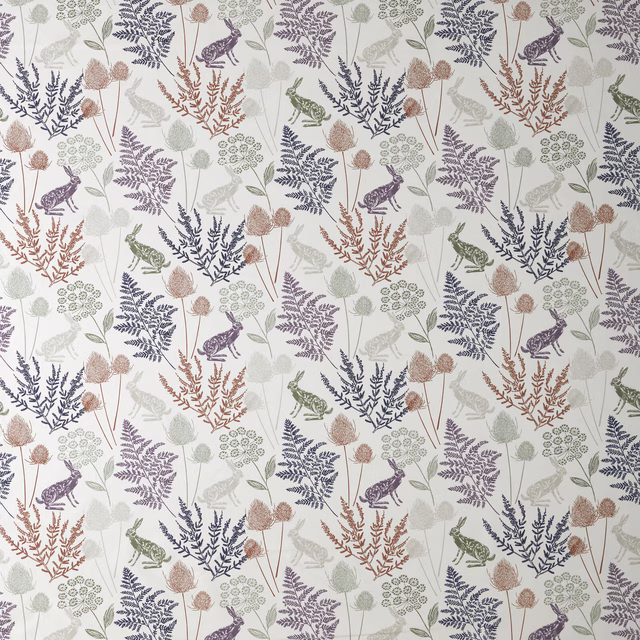 Printed cotton fabric with rabbits, ferns and seedheads in muted lilac, sage and terracotta