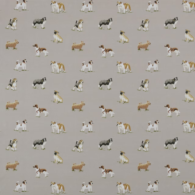 Swatch of caramel beige cotton fabric with small repeated painted dogs