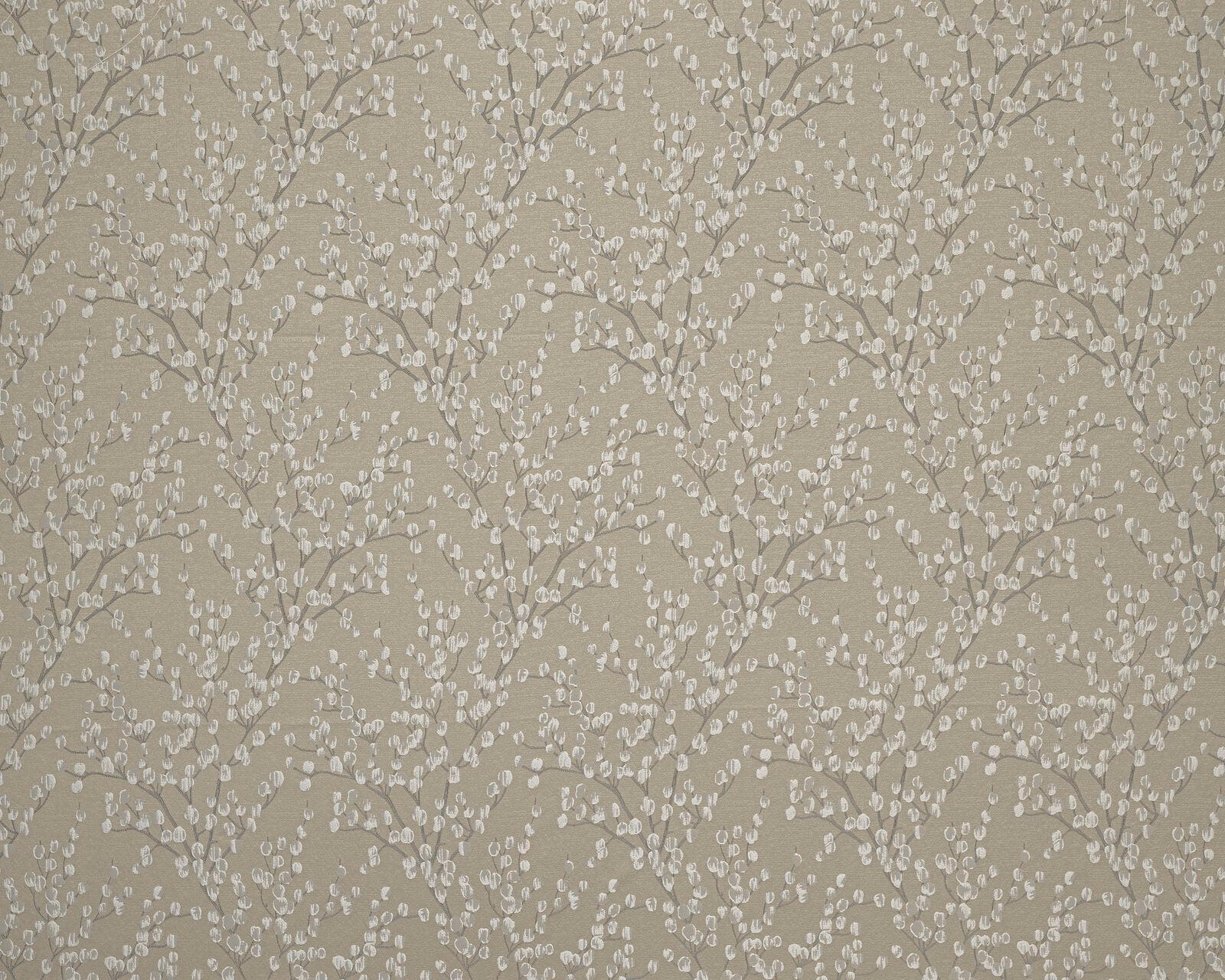 Warm caramel-beige fabric with pale trailing botanical leaf pattern