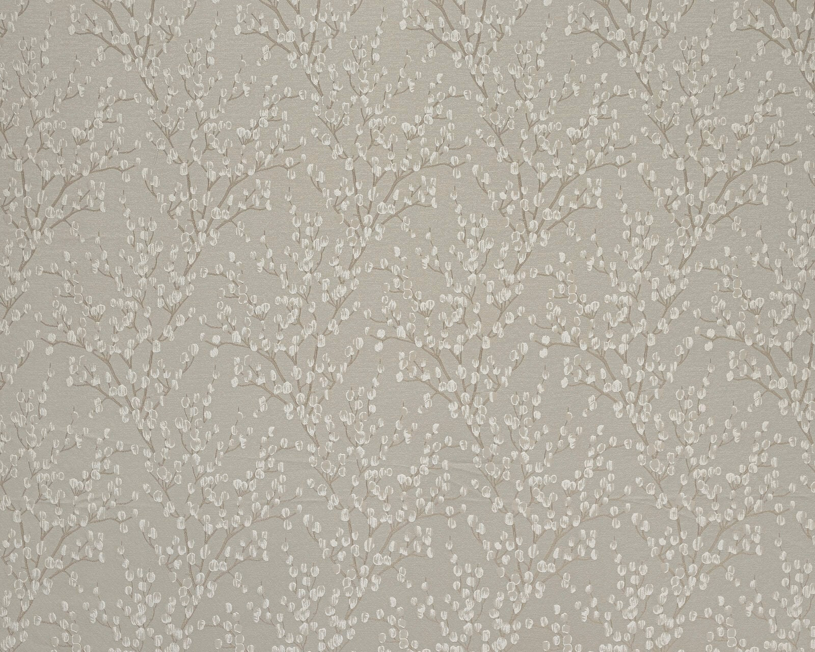 Soft beige botanical fabric with delicate ivory leaf trail pattern
