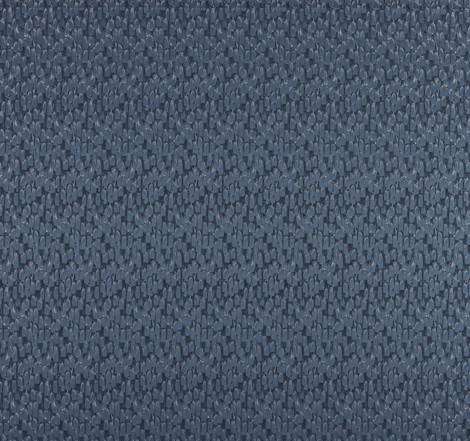 Close-up of slate blue textured fabric with small pebble-like weave