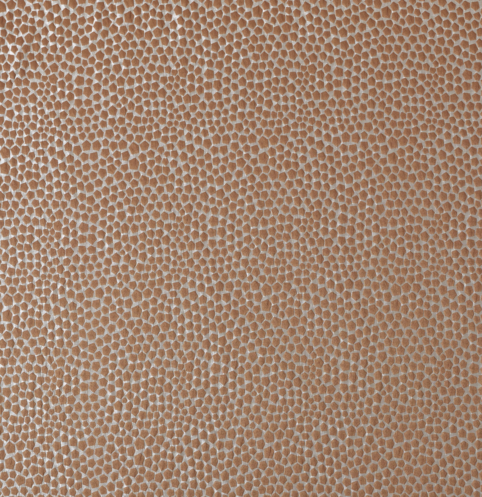Close-up of copper terracotta textured fabric with small pebble-like pattern
