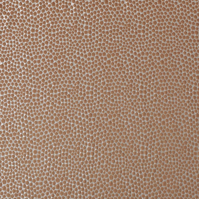 Close-up of copper terracotta textured fabric with small pebble-like pattern