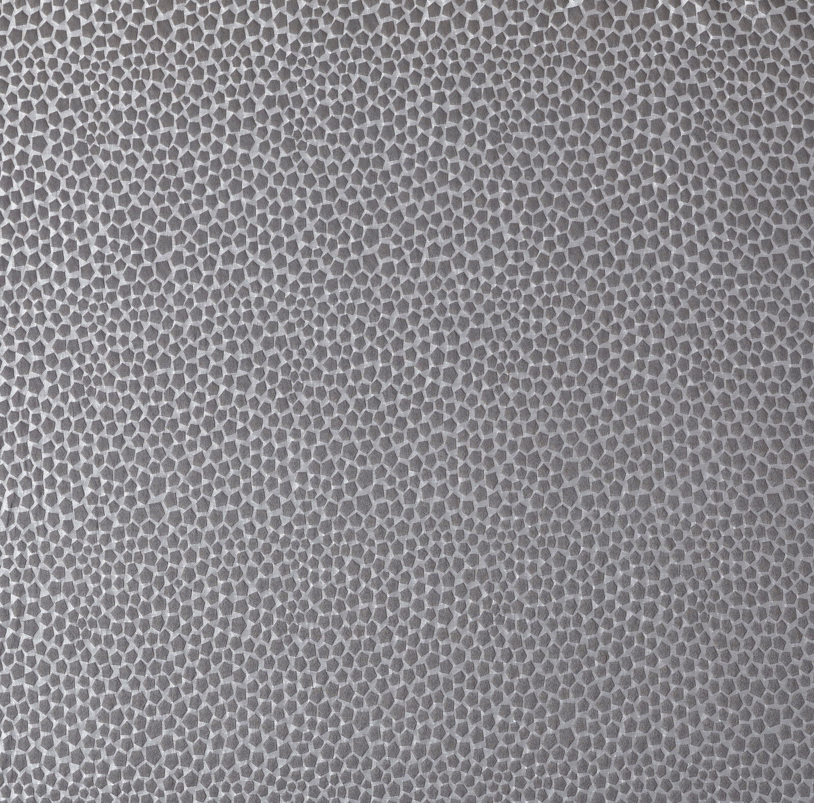 Close-up of cool graphite grey textured fabric with small pebble-like pattern