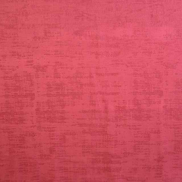 Rich raspberry pink textured plain fabric swatch with subtle tonal striations