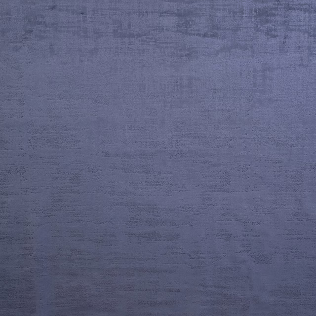 Muted denim-blue textured fabric swatch with a softly striated weave