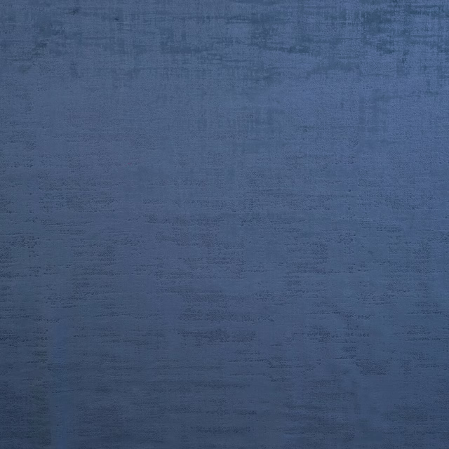 Deep indigo blue plain-textured fabric with subtle woven striations