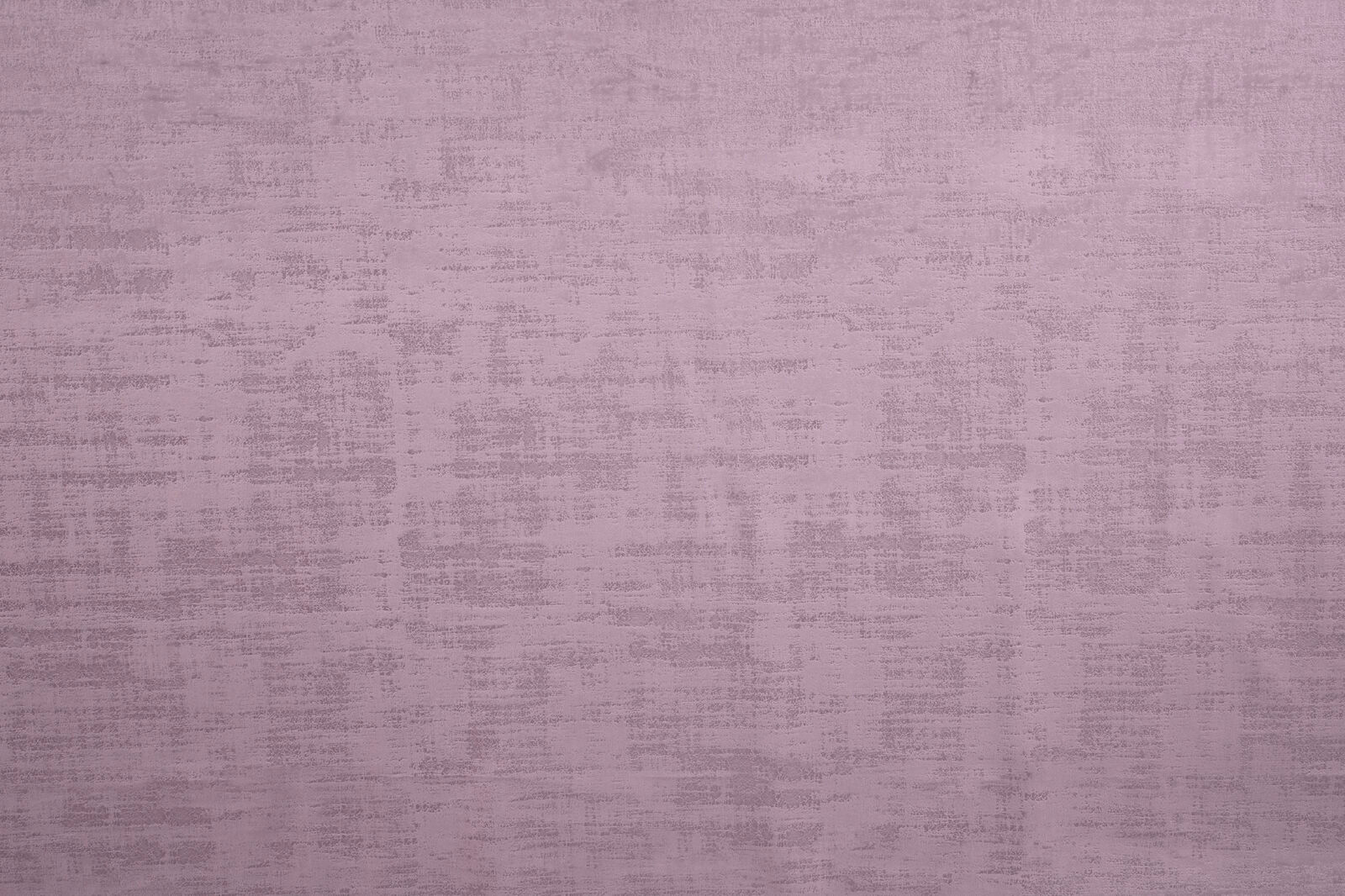 Soft dusty orchid plain fabric with subtle textured weave and matte finish
