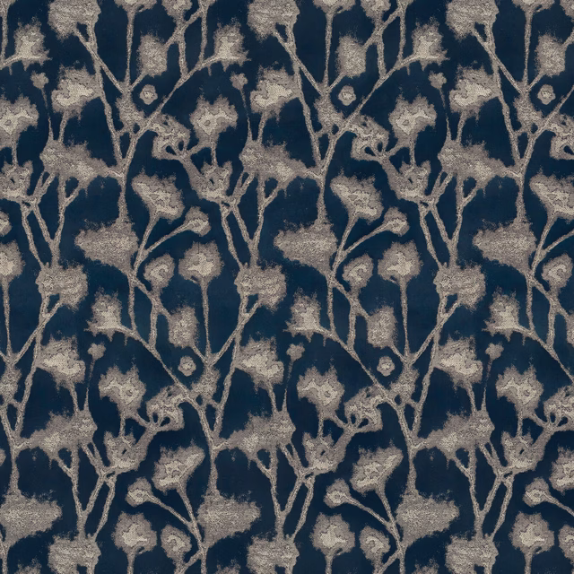 Inky blue botanical drapery fabric with pale beige leafy stems and textured motif