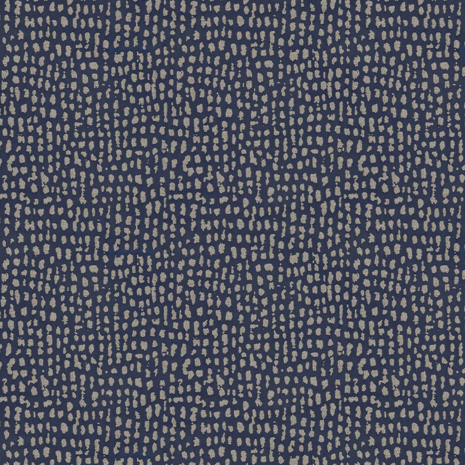 Blue fabric swatch with small beige abstract dots and a matte woven texture