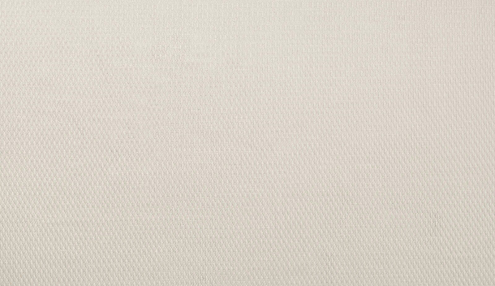 Soft ivory woven fabric with fine diamond texture