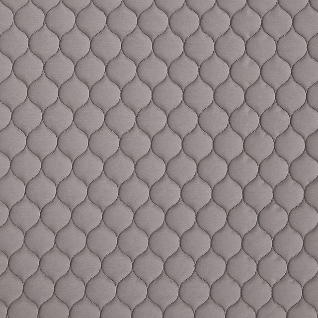 Soft graphite grey fabric with small embossed linked-scale texture
